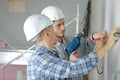 Professional workmen working on wall Royalty Free Stock Photo