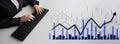 Business Analysis with Keyboard and Graphs Representing Financial Growth and Market Trends in a Modern Office Royalty Free Stock Photo