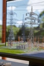 Professional workstation showing a 3D CAD model of power grid infrastructure with underground cables.