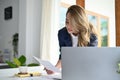 Professional Asian businesswoman busy working on her financial task Royalty Free Stock Photo