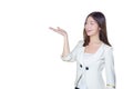 Professional young Asian female long brown hair in white suit is acting hand shows as presenting something and smiling working Royalty Free Stock Photo