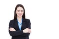 Professional young Asian woman office worker who has long hair wears black formal suit with blue shirt while she arm crossing and Royalty Free Stock Photo