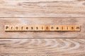 Professionalism word written on wood block. Professionalism text on wooden table for your desing, concept Royalty Free Stock Photo