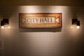 Professionally designed tiled wall displaying the words "City Hall" in NYC.