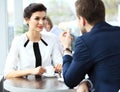 Professionals chatting during a coffee break