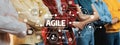 Professionals Collaborating in Agile Project Management with Visual Representation of Agile Methodology Concepts and Royalty Free Stock Photo