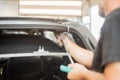 Repairing dents in a car