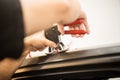 Reparing dents in a car Royalty Free Stock Photo