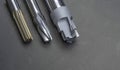 professoinal multi cutting tools special set. drill, endmill, cutter. Material carbide. Used for metalwork. Isolated on dark
