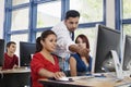 Professor Assisting Students In Class Royalty Free Stock Photo