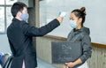 Professor fever check young woman before going to class. Open university first health checks up measurement as epidemic prevention