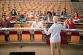 Professor Holding Lecture to a Multi Ethnic Group of Students. Young People Studying at the University Royalty Free Stock Photo