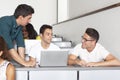 Professor with male students Royalty Free Stock Photo
