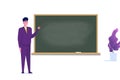 Professor or teacher standing near blank school blackboard. Royalty Free Stock Photo