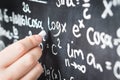 Professor writing mathematical formula and equation Royalty Free Stock Photo