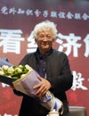 Professor zhangwuchang ( steven cheung ) accept flowers