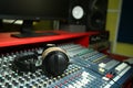 Proffesional headphones on a mixer in a music recording studio