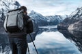 Proffesional photographer at Stegastein viewpoint above Aurlandsfjord in Norway