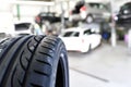 profil of car tyre in the car repair workshop - closeup