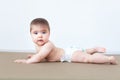 Gymnastics baby-modified stretch with eye contact. Royalty Free Stock Photo