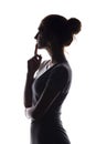 Profile of beautiful girl with hand-picked hair, silhouette of a woman on a white isolated background Royalty Free Stock Photo