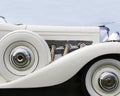 Profile of classic Duesenberg automobile.