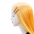 Profile of female mannequin with blond hair on isolated background Royalty Free Stock Photo