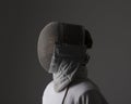 Profile of a fencer in fencing mask