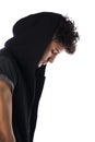 Profile of handsome tough young man in dark hoodie isolated