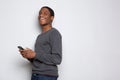 Profile happy african american man with cellphone against white background Royalty Free Stock Photo