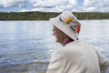 Profile image of a senior lady wearing a fishing hat. Royalty Free Stock Photo