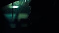 Profile of a man in car on dark night. Royalty Free Stock Photo
