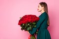 Profile photo of adorable charming lady hold large red long roses bouquet boyfriend birthday gift surprise hear pleasant