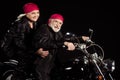 Profile photo of aged bikers grey hair man lady married couple drive speed vintage chopper traveling together feel young Royalty Free Stock Photo