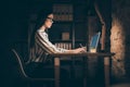 Profile photo of amazing asian business lady looking notebook screen on table writing report new project sitting chair