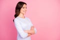 Profile photo of attractive pretty lady toothy smiling self-confident business woman arms crossed look side empty space Royalty Free Stock Photo