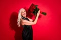 Profile photo of attractive retired white haired lady luxury rich person hold raise big bunch roses joyful present Royalty Free Stock Photo