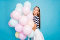 Profile photo of beautiful lady flirty mood bring many air balloons boyfriend birthday event sending kisses wear striped Royalty Free Stock Photo