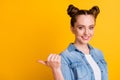 Profile photo of charming attractive teen lady two buns direct thumb finger side empty space show shopping offer