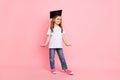 Profile photo of charming school girl look empty space wear hat specs white t-shirt pink color background