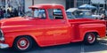 A Profile photo of a Classic 1953 Chevrolet Orange Pickup Truck Royalty Free Stock Photo
