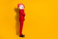 Profile photo of confident employer folded hands wear cock polygonal mask red tux isolated yellow color background