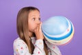 Profile photo of crazy little lady blow inflate air balloon wear crown dotted pajama isolated purple color background Royalty Free Stock Photo