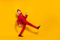 Profile photo of disco entertainer dance have fun wear rooster polygonal mask red tux isolated yellow color background Royalty Free Stock Photo