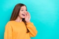 Profile photo of excited teen girl wear orange sweatshirt touch cheeks palm announcement black friday look mockup