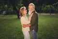 Profile photo of flirty emotion pensioner grey hair couple hug wear trend shirts outside spend free weekend Royalty Free Stock Photo