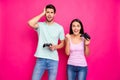 Profile photo of funny guy and lady couple spending weekend together playing video games winner and loser wear casual Royalty Free Stock Photo