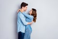 Profile photo lady guy couple in love cuddle hugging together holding hands romantic feelings slow dance look eyes wear