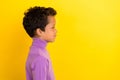 Profile photo portrait of charming little boy look promo poster copyspace wear trendy violet garment isolated on yellow Royalty Free Stock Photo