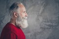 Profile photo of positive aged guy looking empty space deeply thinking cheerful wear red knitted pullover hipster santa